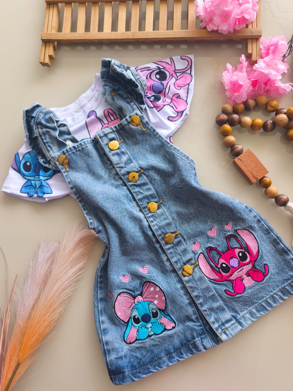 Salopete Stitch e angel laço